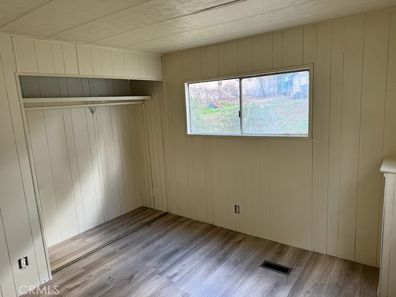 218 Park Way Bodfish, CA 93205 - Photo 11 of 14 a view of small space with wooden floor and a window