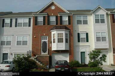 9805 Doubletree Terrace Bowie, MD 20721 - Photo 1 of 1 a front view of a house with balcony
