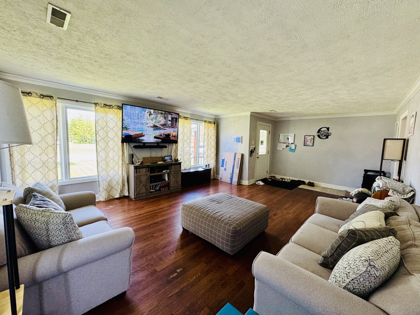 203 West Callie Street Sesser, IL 62884 - Photo 11 of 27 a bedroom with furniture and a large window