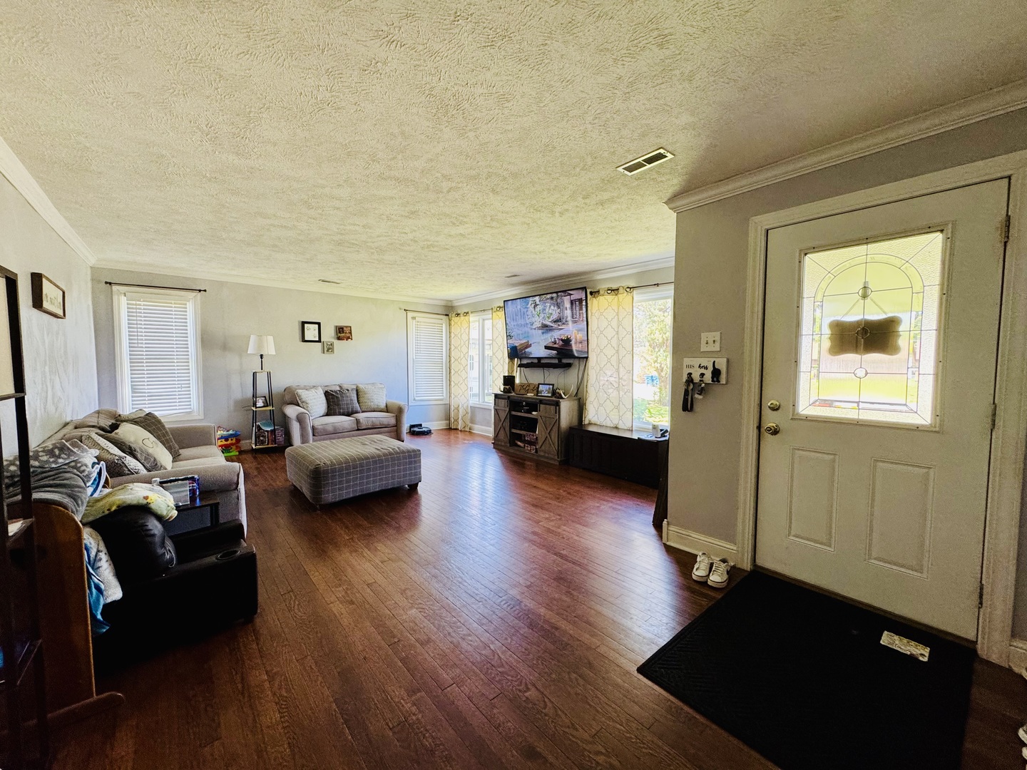 203 West Callie Street Sesser, IL 62884 - Photo 12 of 27 a living room with furniture and a wooden floor
