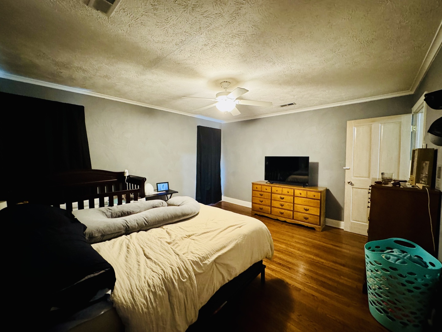 203 West Callie Street Sesser, IL 62884 - Photo 18 of 27 a bedroom with furniture and a flat screen tv