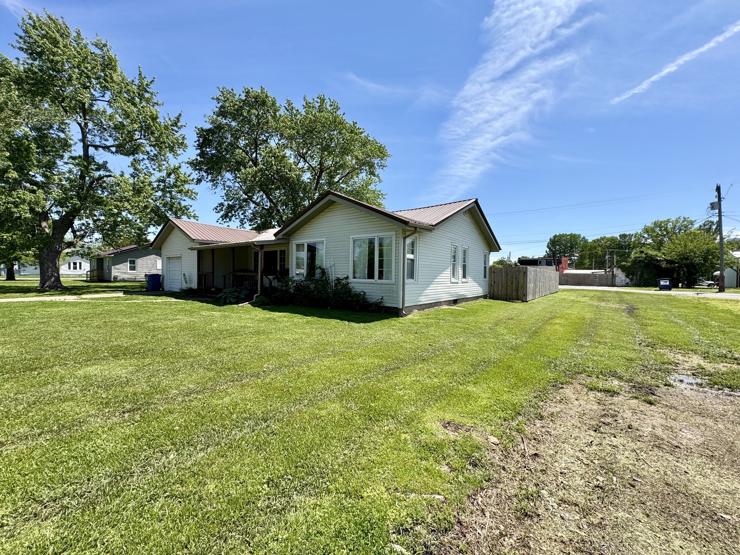 203 West Callie Street Sesser, IL 62884 - Photo 3 of 27 a front view of house with yard and green space