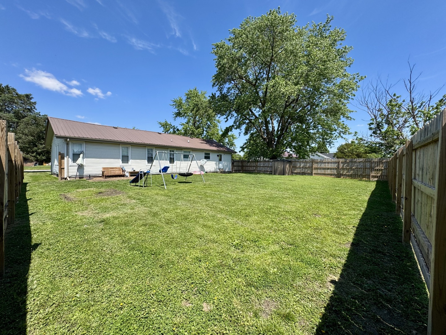 203 West Callie Street Sesser, IL 62884 - Photo 5 of 27 a front view of house with yard and green space