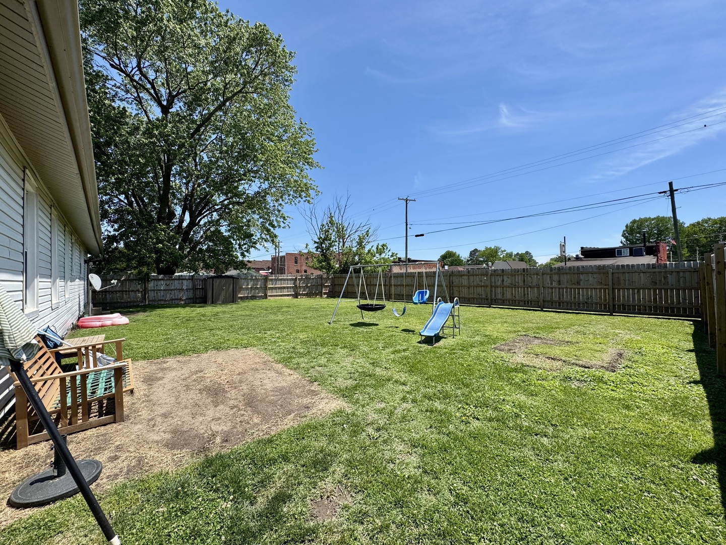 203 West Callie Street Sesser, IL 62884 - Photo 6 of 27 a view of a garden with a slide