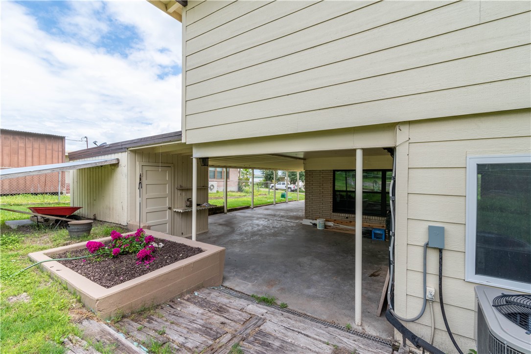 143 Trail Ridge Drive Sandia, TX 78383 - Photo 28 of 40 a front view of a house with garden