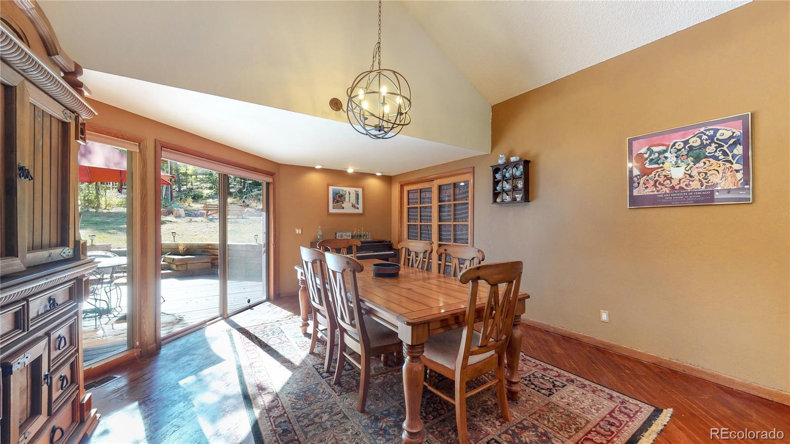 2720 South Spring Gulch Road Idaho Springs, CO 80452 - Photo 6 of 38 a view of a dining room with furniture window and outside view