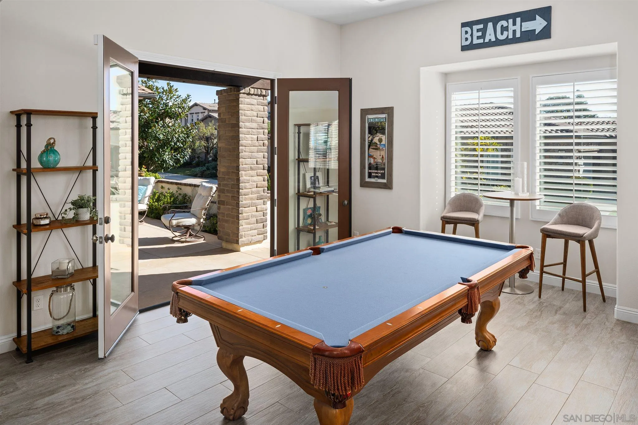 700 Blossom Road Encinitas, CA 92024 - Photo 13 of 50 a room with pool table and windows