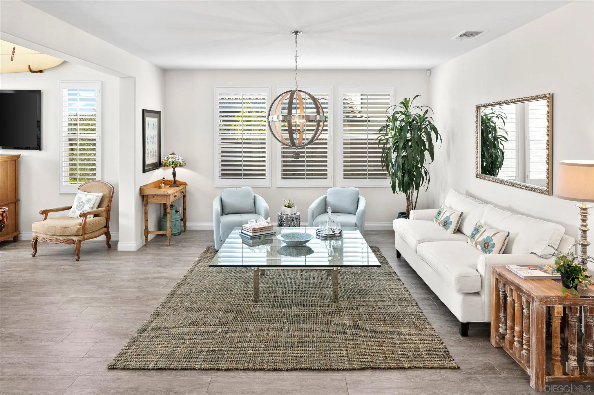 700 Blossom Road Encinitas, CA 92024 - Photo 14 of 50 a spacious bedroom with furniture and a large window