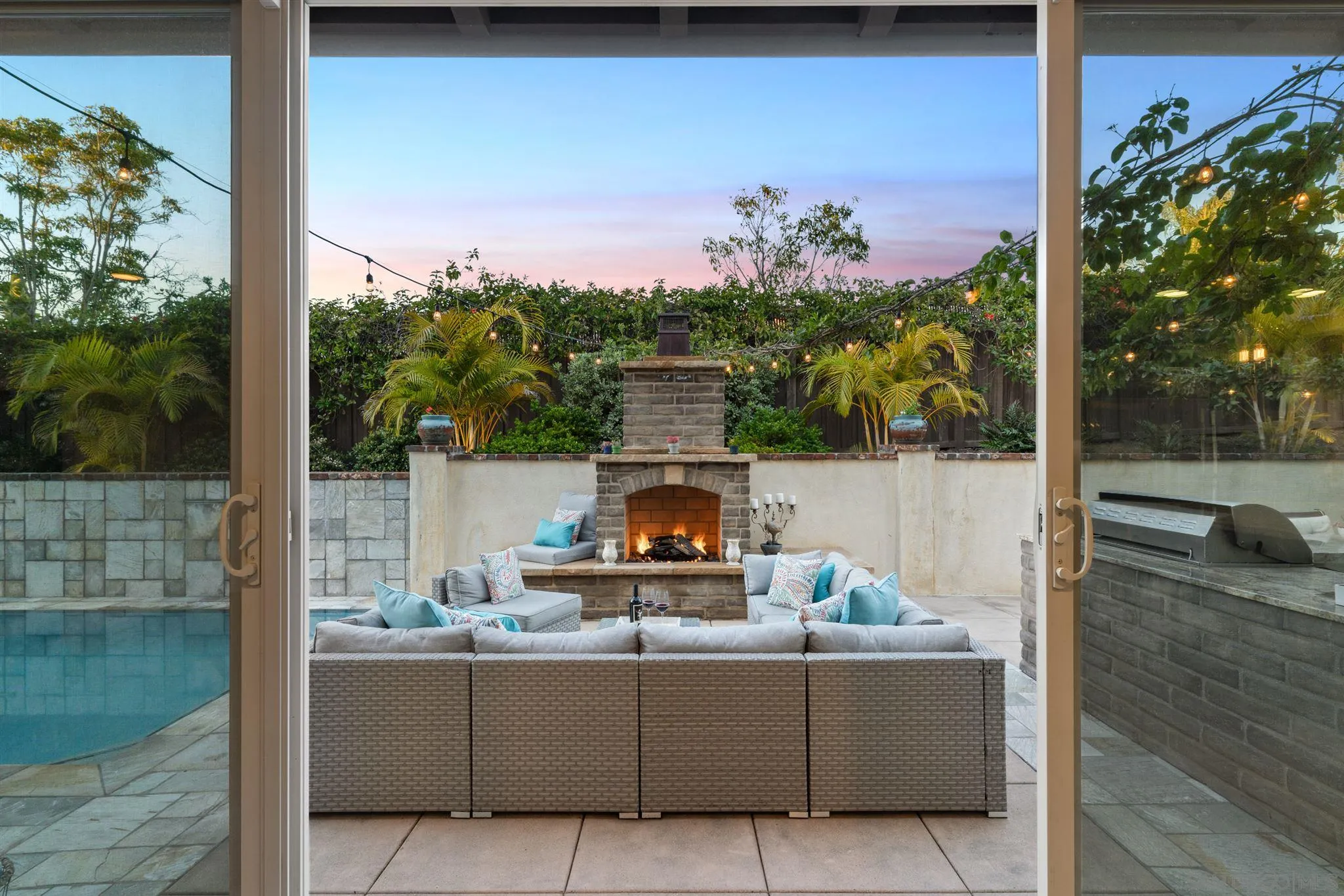 700 Blossom Road Encinitas, CA 92024 - Photo 20 of 50 a view of a floor to ceiling window and a fireplace