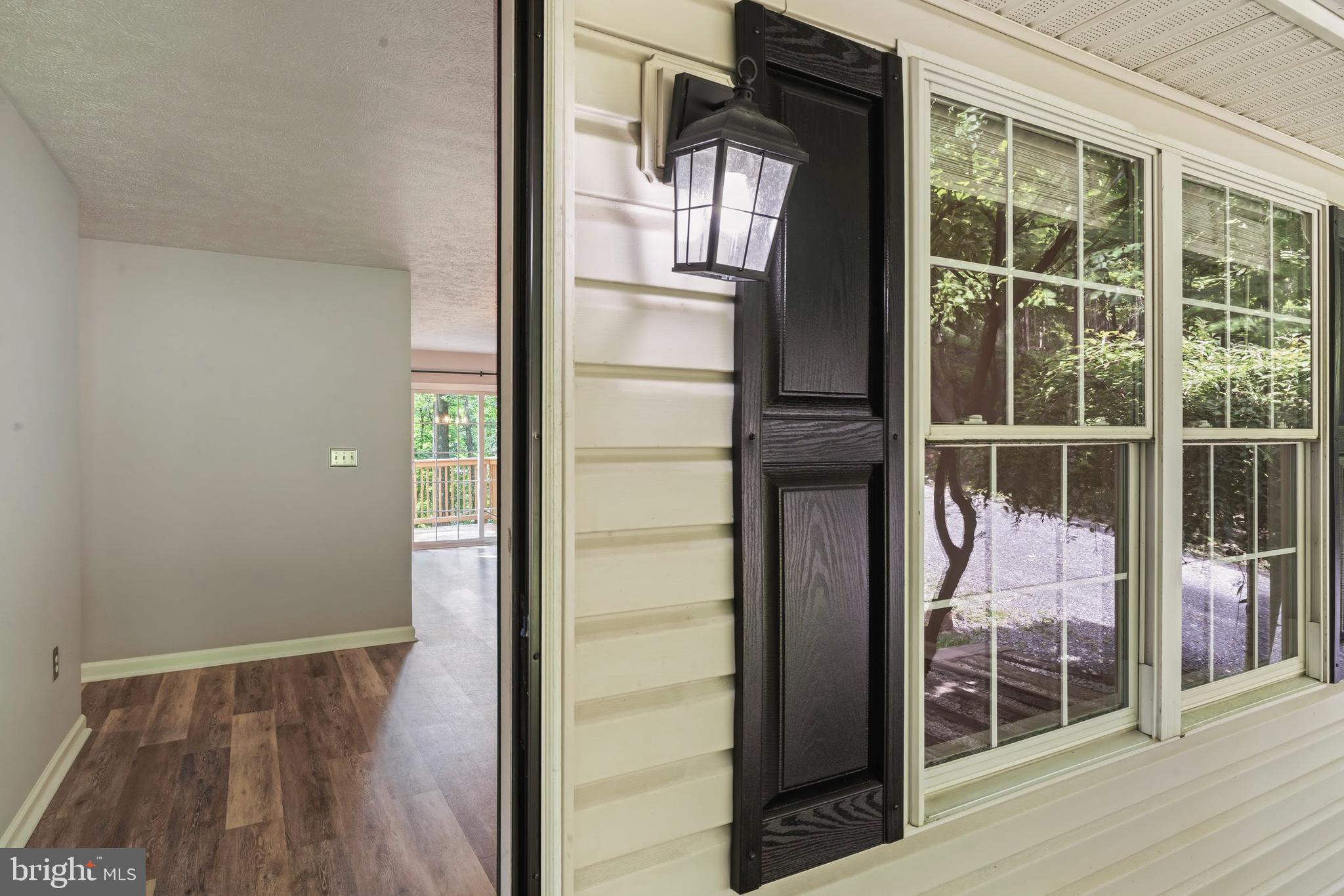 997 Wilderness Road Linden, VA 22642 - Photo 18 of 61 Entrance door to living room & new exterior light