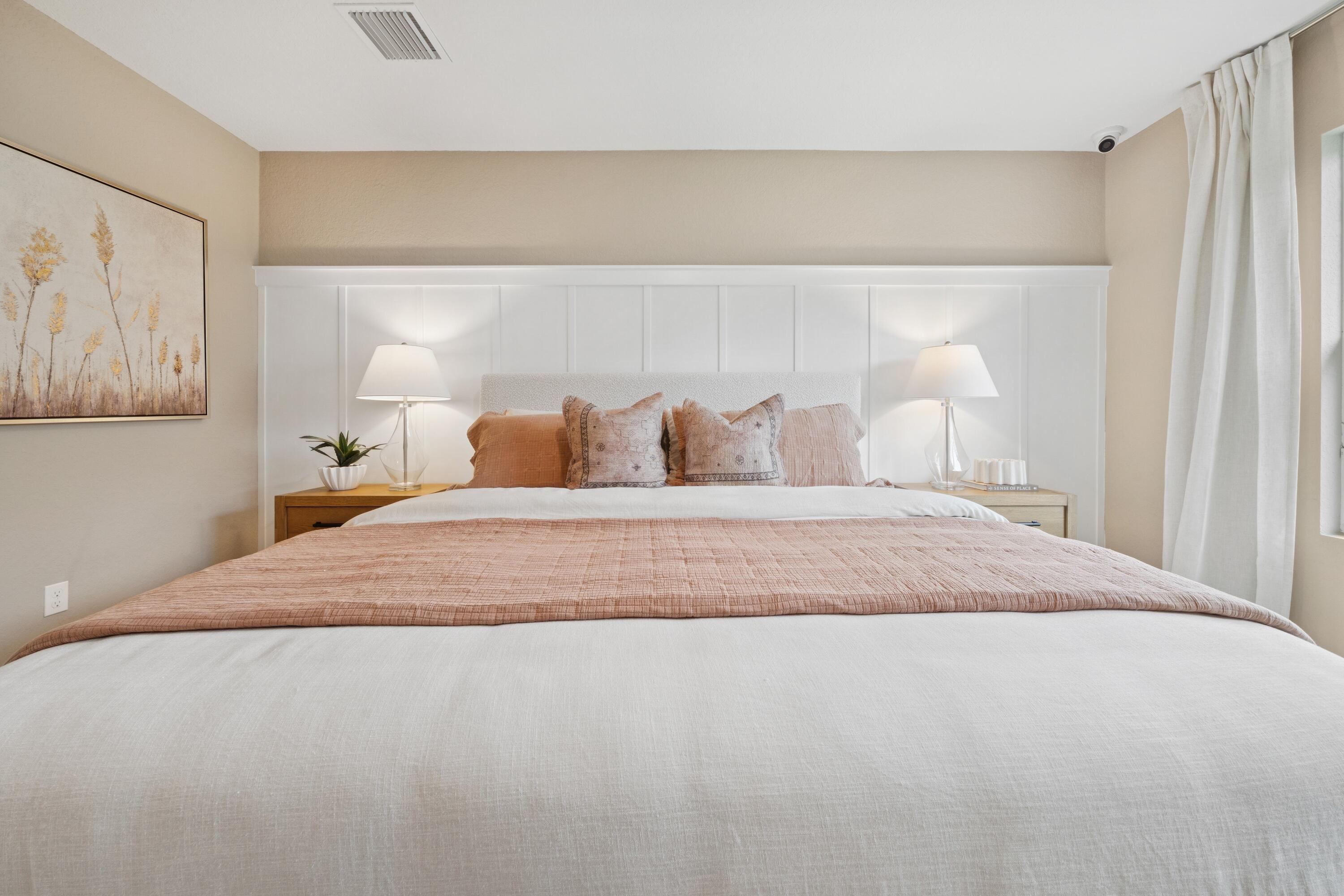 9736 Apollo Avenue, Unit 3 Fort Pierce, FL 34945 - Photo 30 of 39 a bedroom with a bed and a window