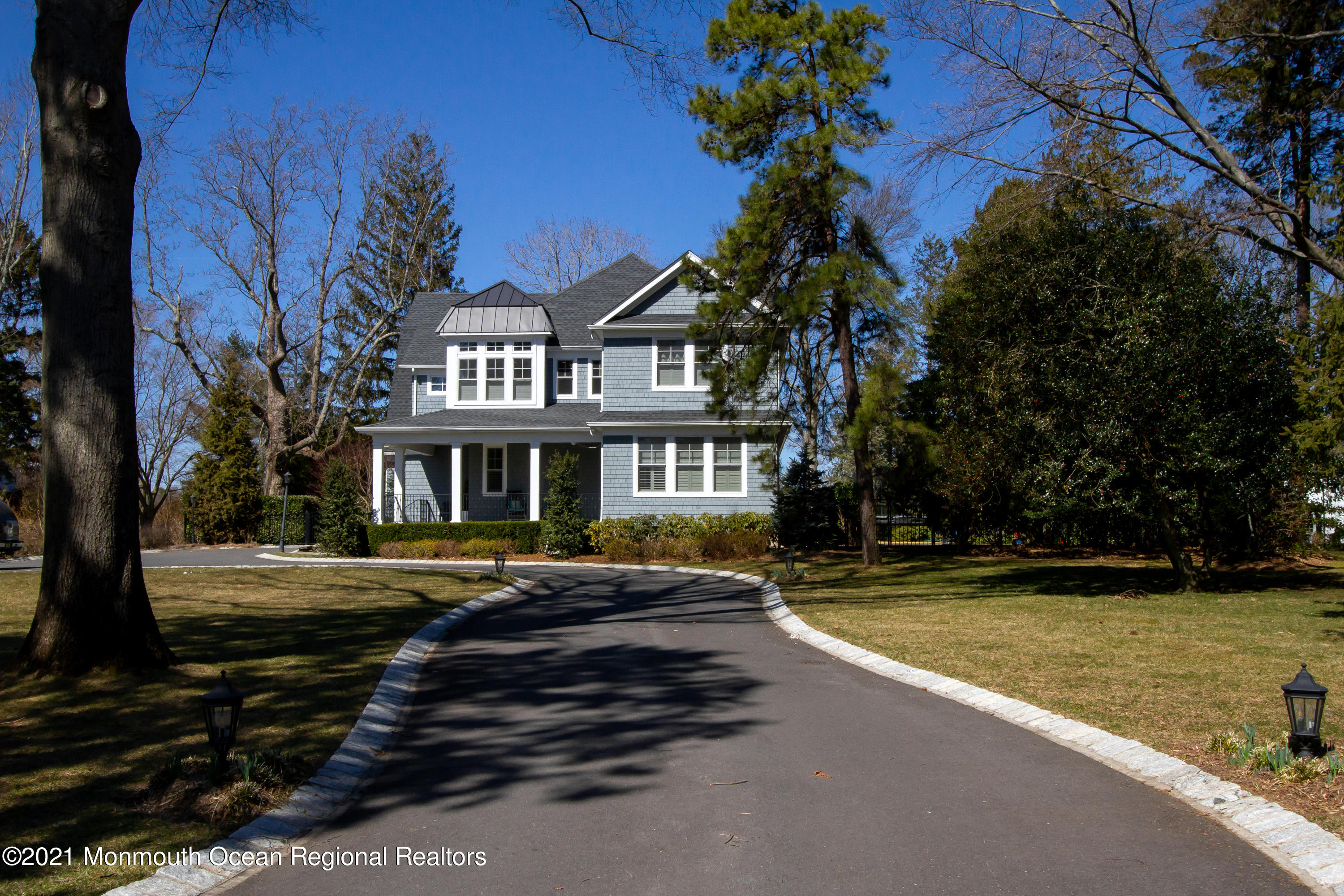 451 Little Silver Point Road Little Silver, NJ 07739 - Photo 2 of 63 a front view of a house with a yard