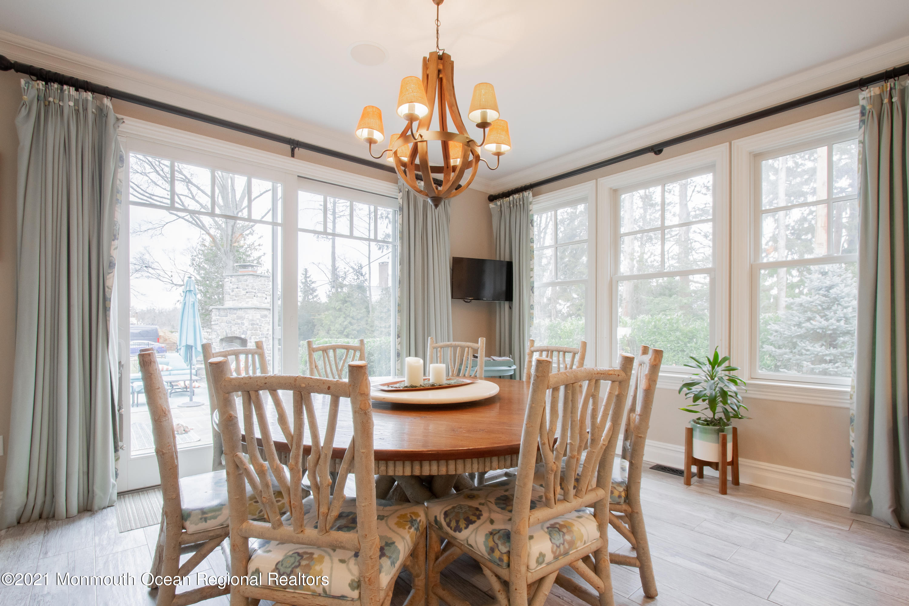 451 Little Silver Point Road Little Silver, NJ 07739 - Photo 16 of 63 a view of a dining room with furniture window and wooden floor