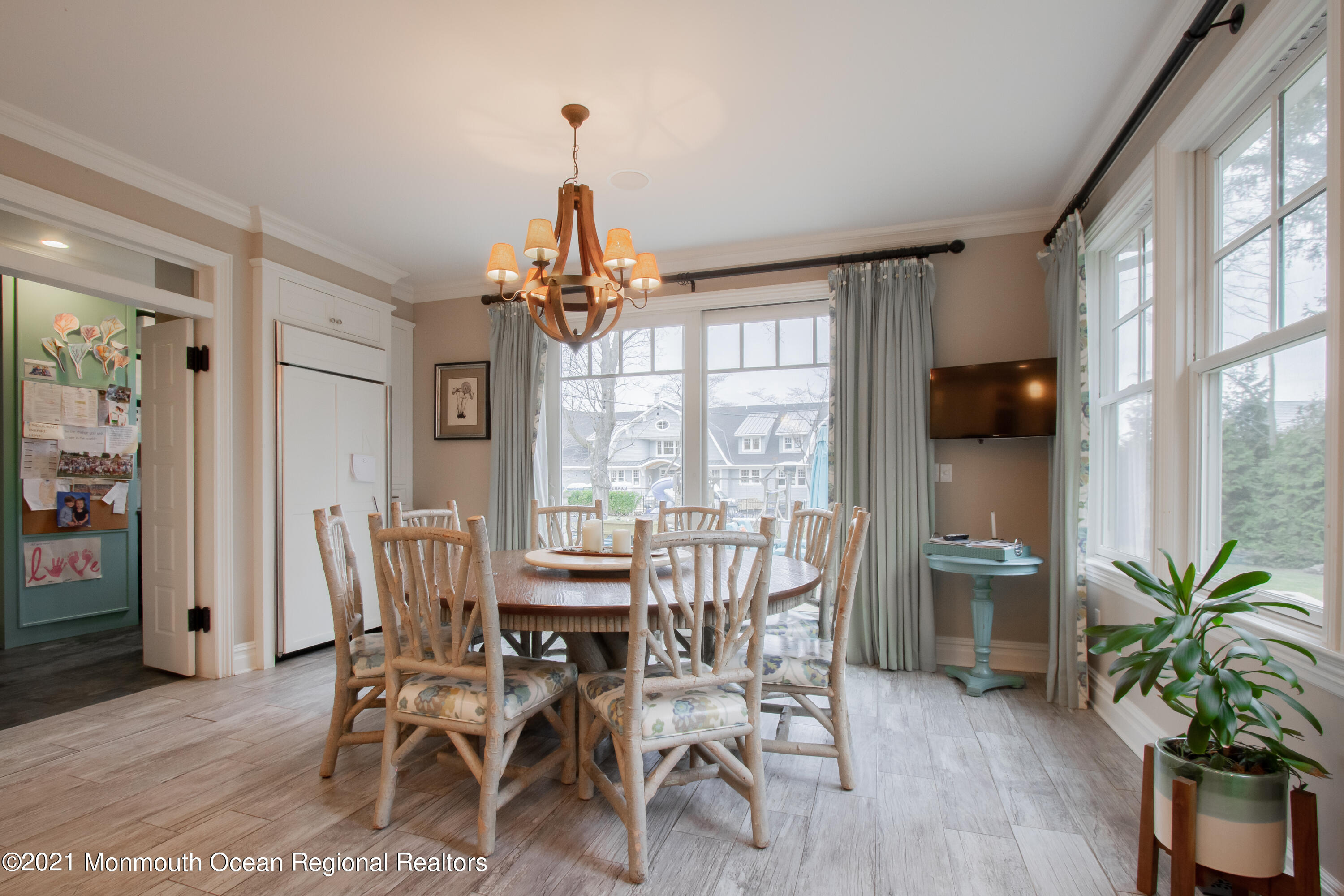 451 Little Silver Point Road Little Silver, NJ 07739 - Photo 17 of 63 a view of a dining room with furniture window and wooden floor