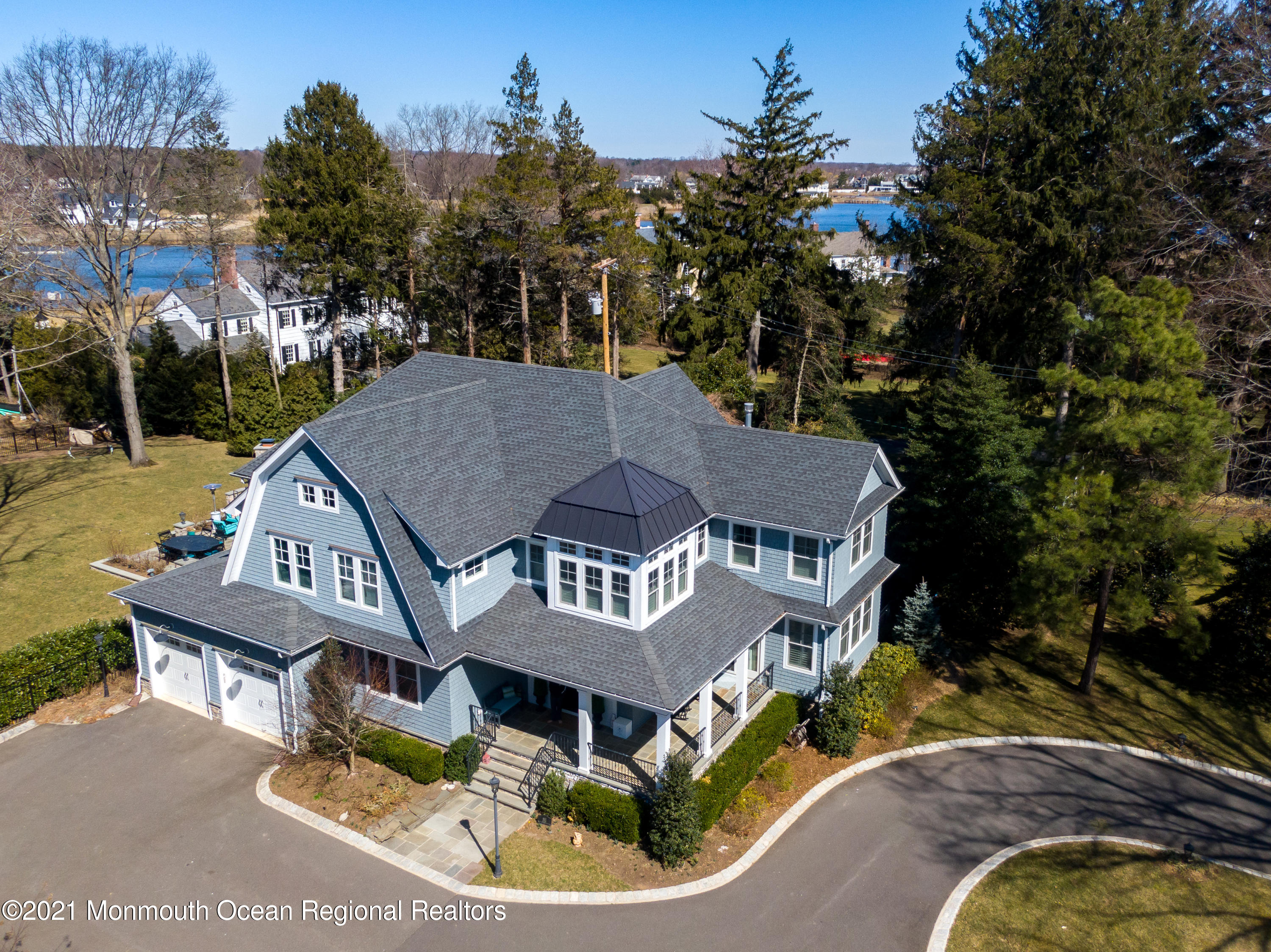 451 Little Silver Point Road Little Silver, NJ 07739 - Photo 3 of 63 a aerial view of a house with swimming pool and garden
