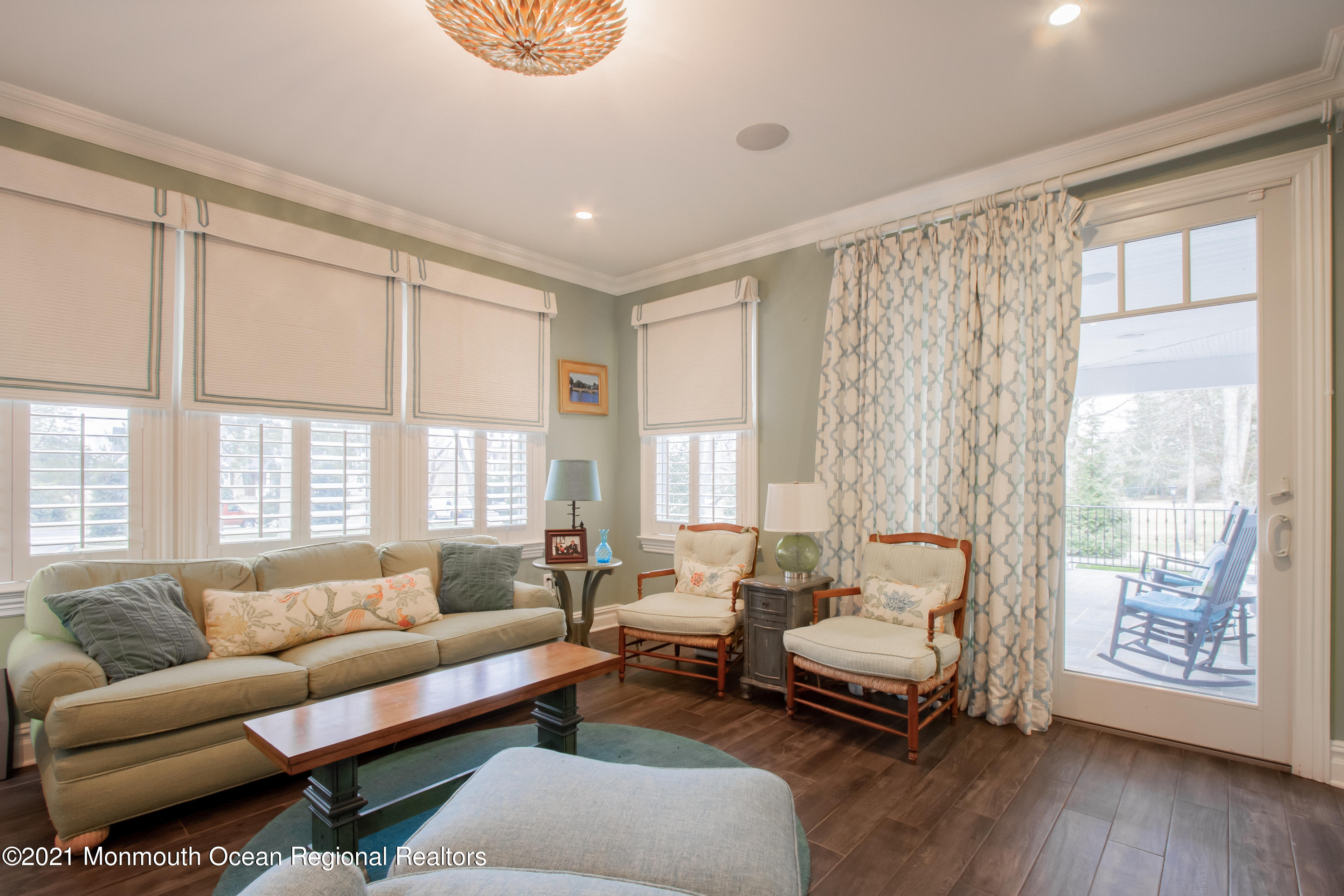 451 Little Silver Point Road Little Silver, NJ 07739 - Photo 24 of 63 a living room with furniture and a large window