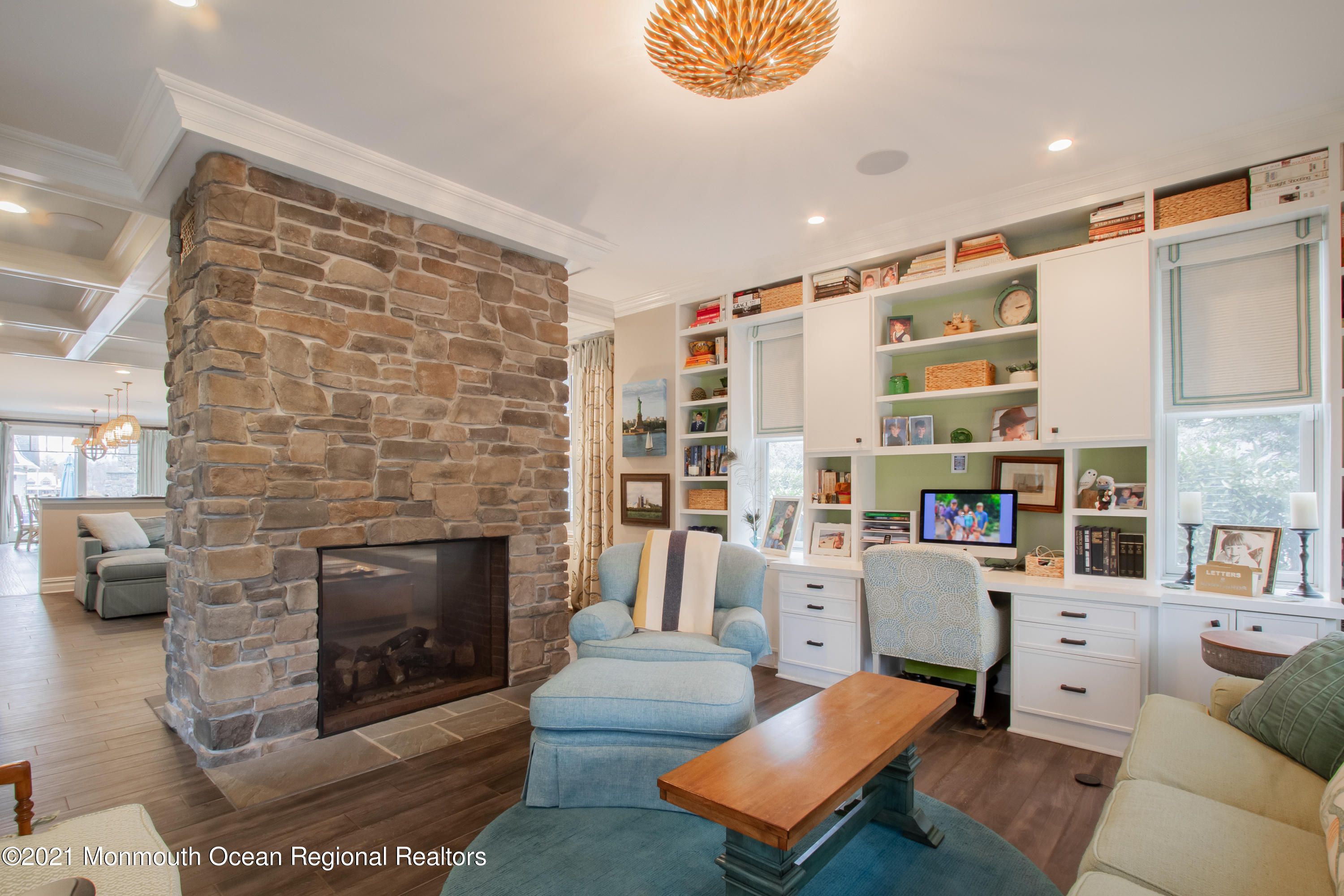 451 Little Silver Point Road Little Silver, NJ 07739 - Photo 26 of 63 a living room with furniture a fireplace and a flat screen tv