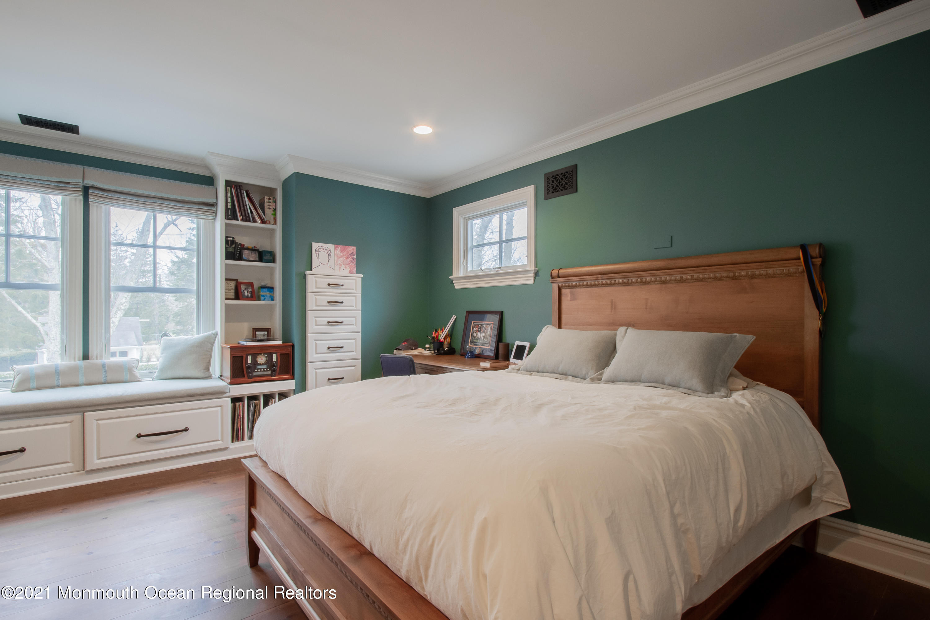 451 Little Silver Point Road Little Silver, NJ 07739 - Photo 34 of 63 a bedroom with a large bed and a large window