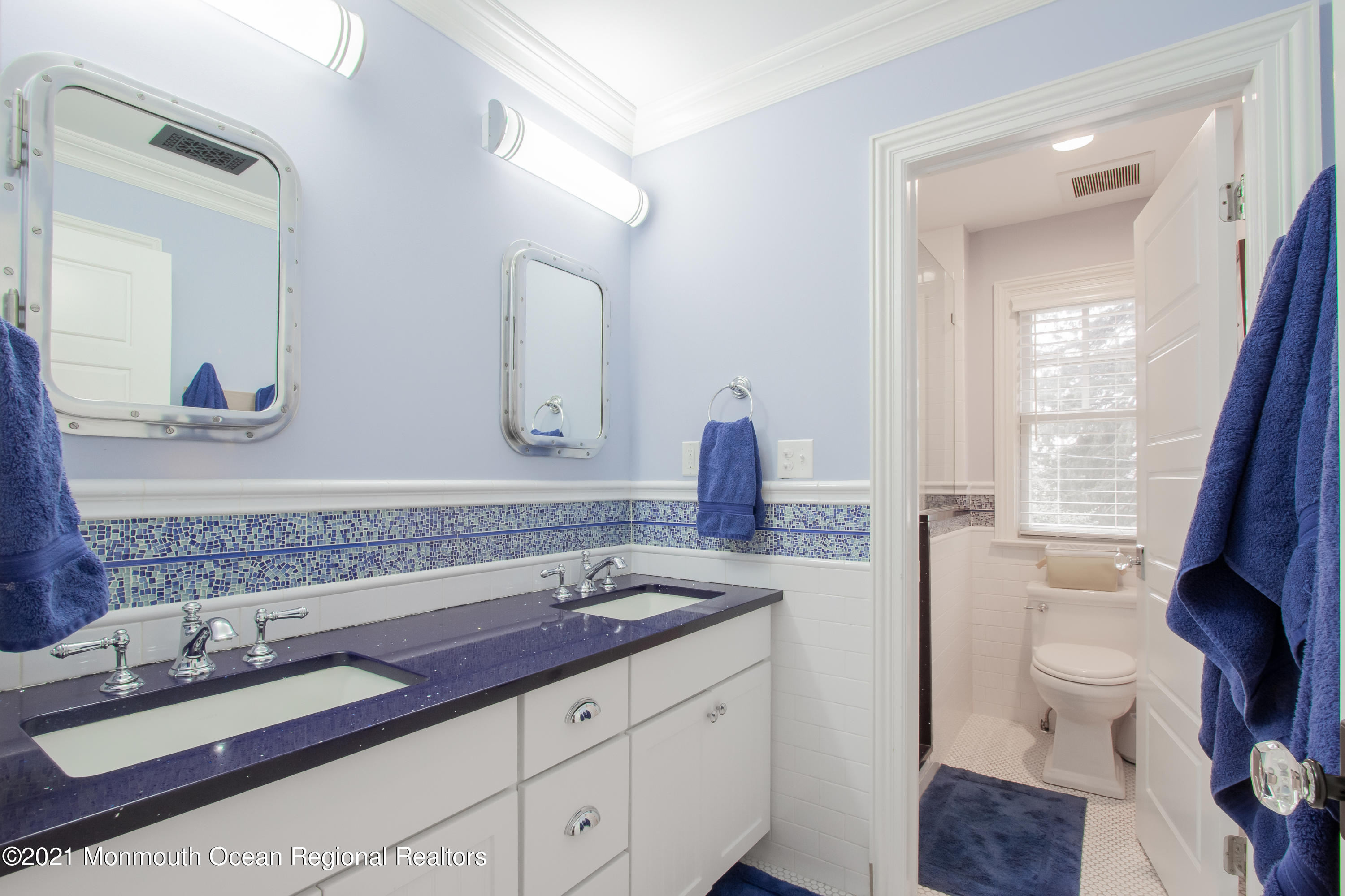 451 Little Silver Point Road Little Silver, NJ 07739 - Photo 37 of 63 a bathroom with a granite countertop double vanity sink a mirror and a toilet