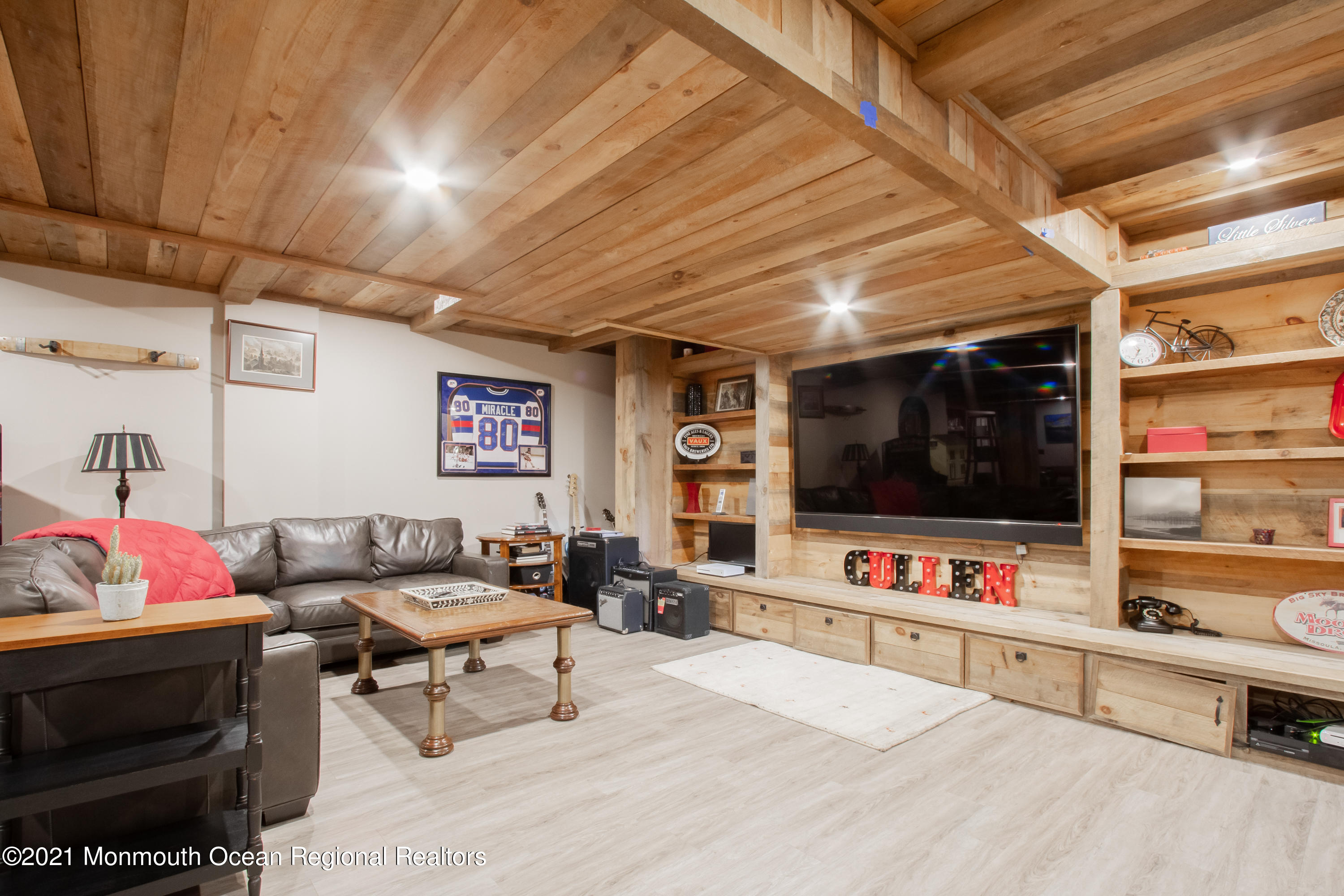 451 Little Silver Point Road Little Silver, NJ 07739 - Photo 43 of 63 a living room with furniture and a flat screen tv