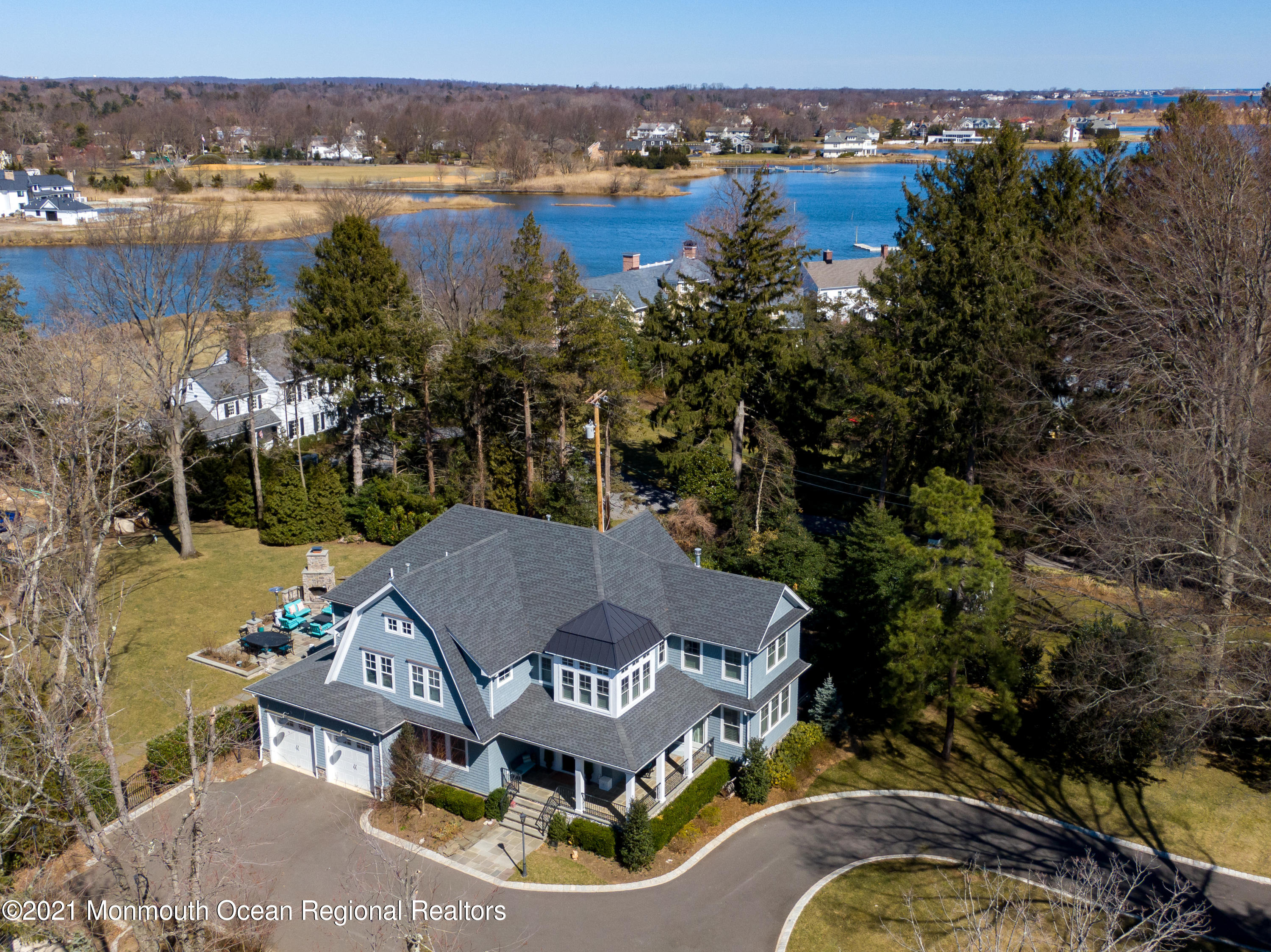 451 Little Silver Point Road Little Silver, NJ 07739 - Photo 49 of 63 a view of a lake with couches and city view