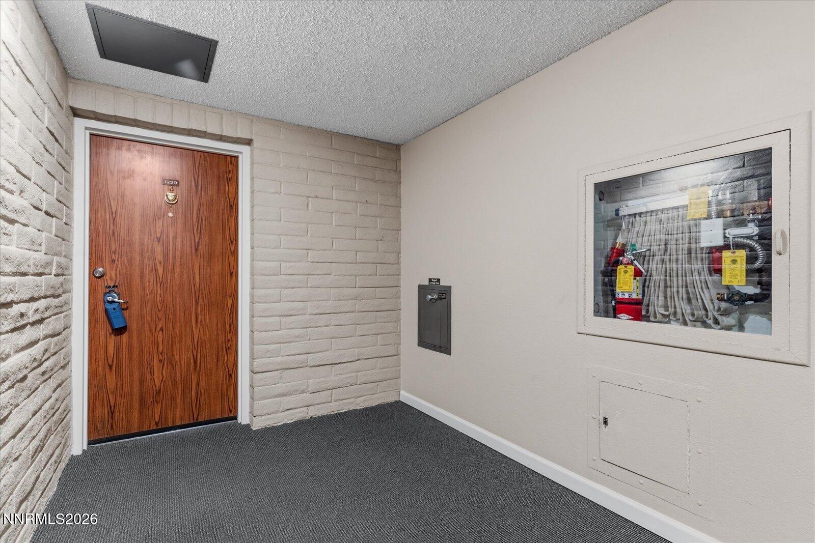 1200 Riverside Drive, Unit 1229 Reno, NV 89503 - Photo 9 of 51 a view of an entryway with front door