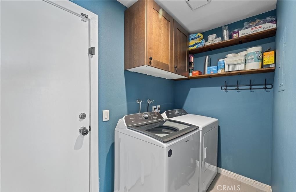 164 Stanford Court, Unit 82 Irvine, CA 92612 - Photo 14 of 34 a utility room with dryer and washer