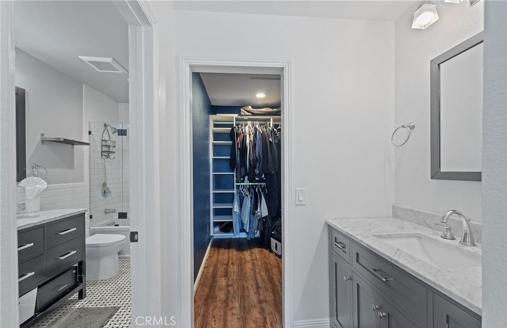 164 Stanford Court, Unit 82 Irvine, CA 92612 - Photo 20 of 34 a bathroom with a sink a toilet and shower