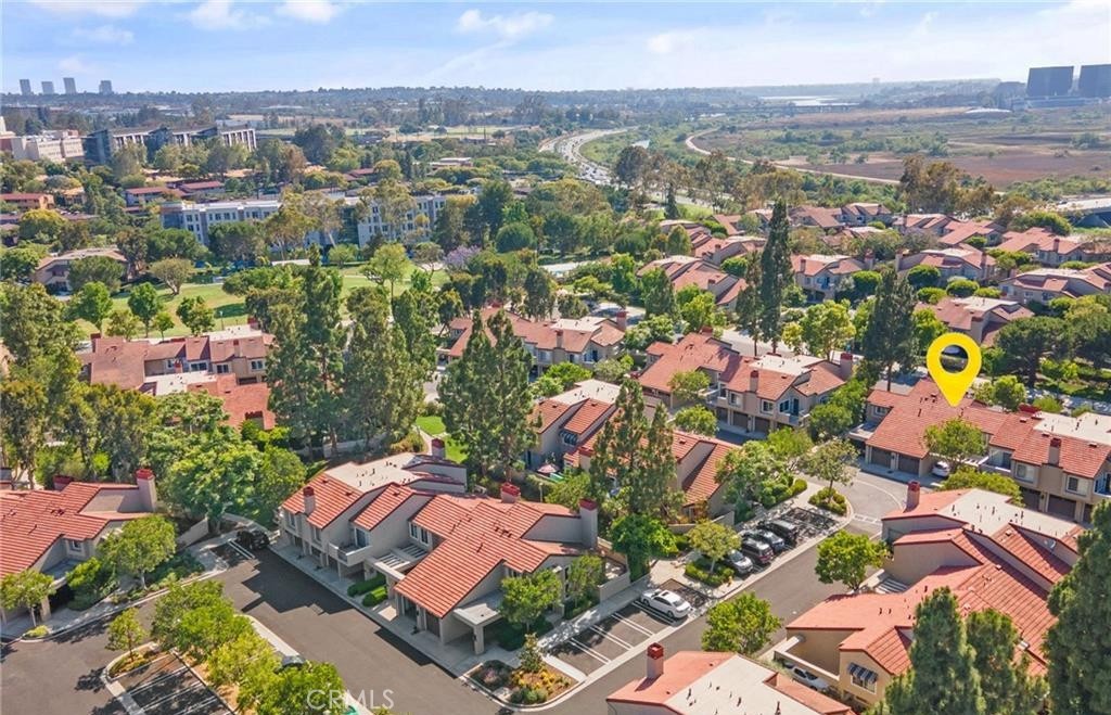 164 Stanford Court, Unit 82 Irvine, CA 92612 - Photo 28 of 34 an aerial view of residential houses with outdoor space