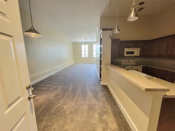 $1,695 | 2315 Harborside Drive, Unit 205, Galveston, TX 77550