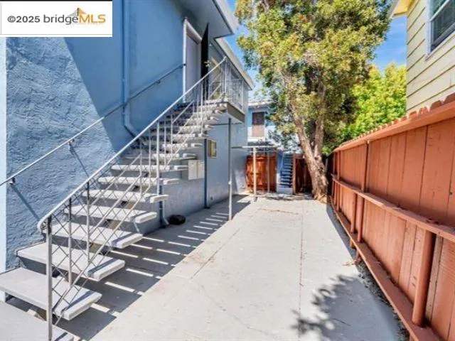 a view of a backyard of the house