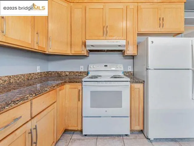 a bathroom with a sink a toilet and bathtub