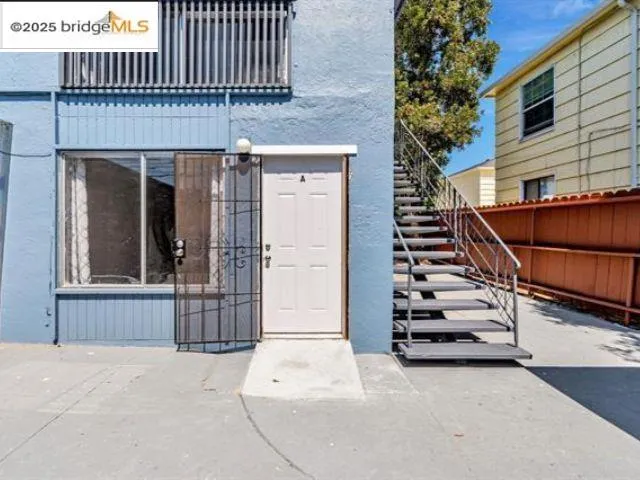 a kitchen with a sink and refrigerator