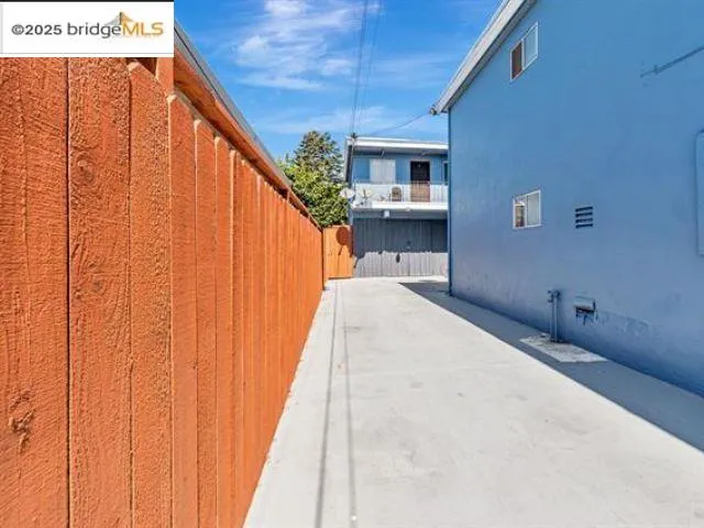 a stove top oven sitting inside of a kitchen