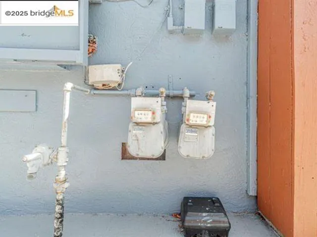 a view of front door with wooden floor