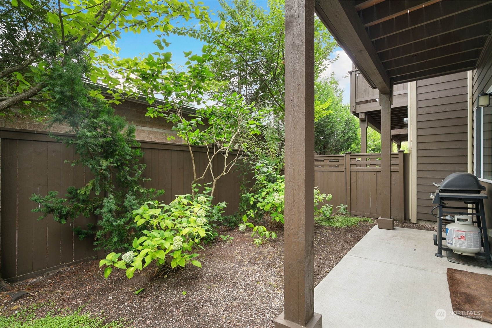 4600 Northeast 3rd Lane, Unit E1 Renton, WA 98059 - Photo 19 of 35 a view of yard with patio