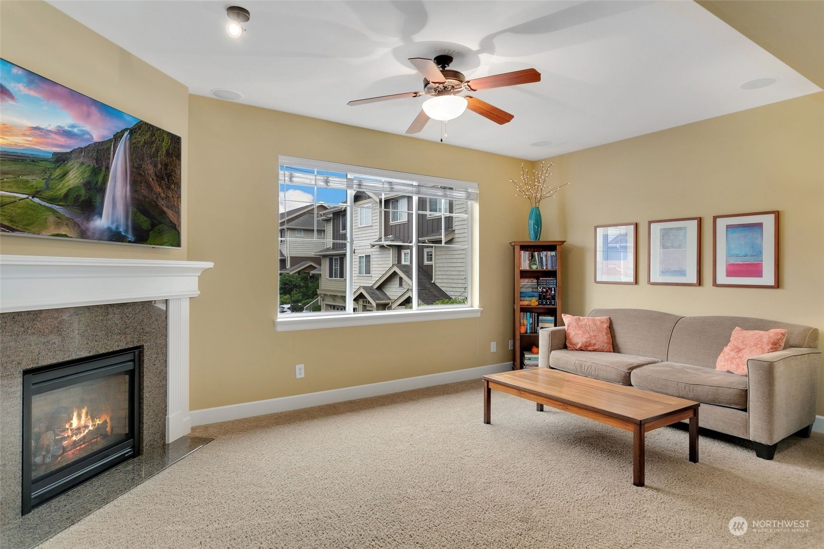 4600 Northeast 3rd Lane, Unit E1 Renton, WA 98059 - Photo 3 of 35 a living room with furniture and a fireplace