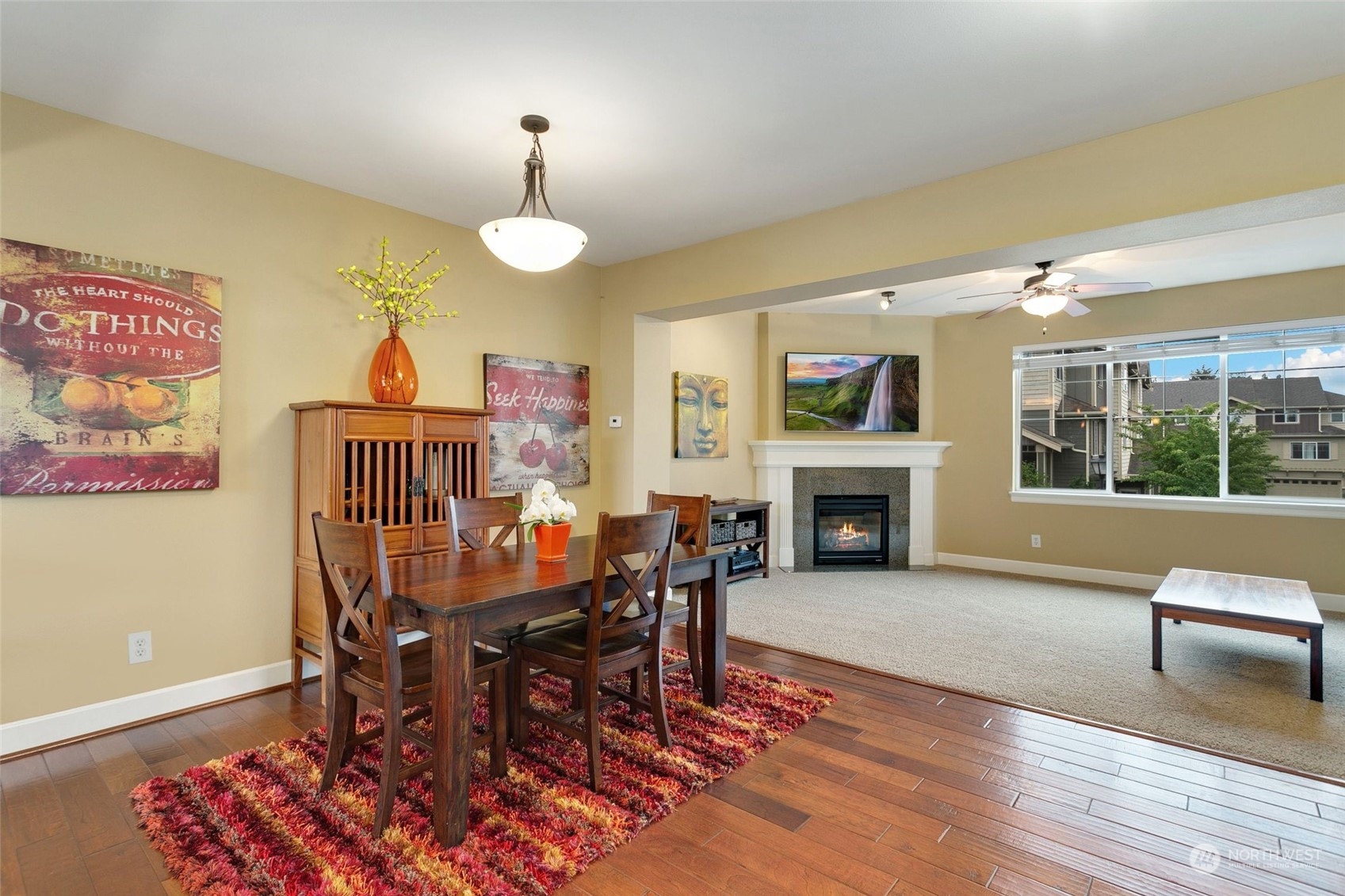 4600 Northeast 3rd Lane, Unit E1 Renton, WA 98059 - Photo 6 of 35 a view of a livingroom with furniture and a fireplace