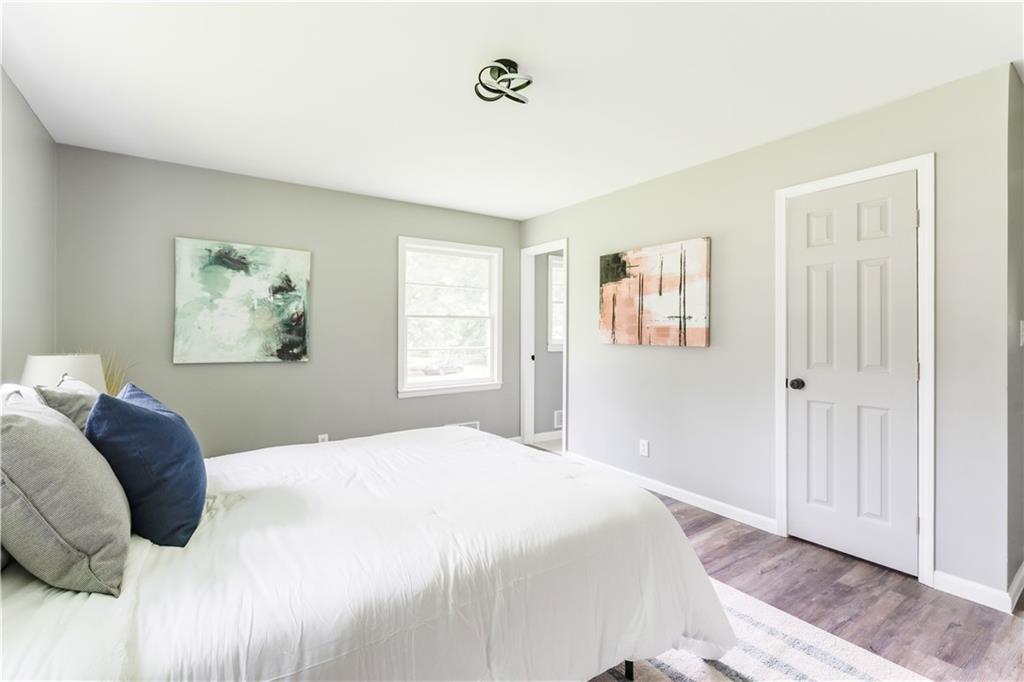 2343 Dawn Drive Decatur, GA 30032 - Photo 19 of 20 a bedroom with a large bed and a window
