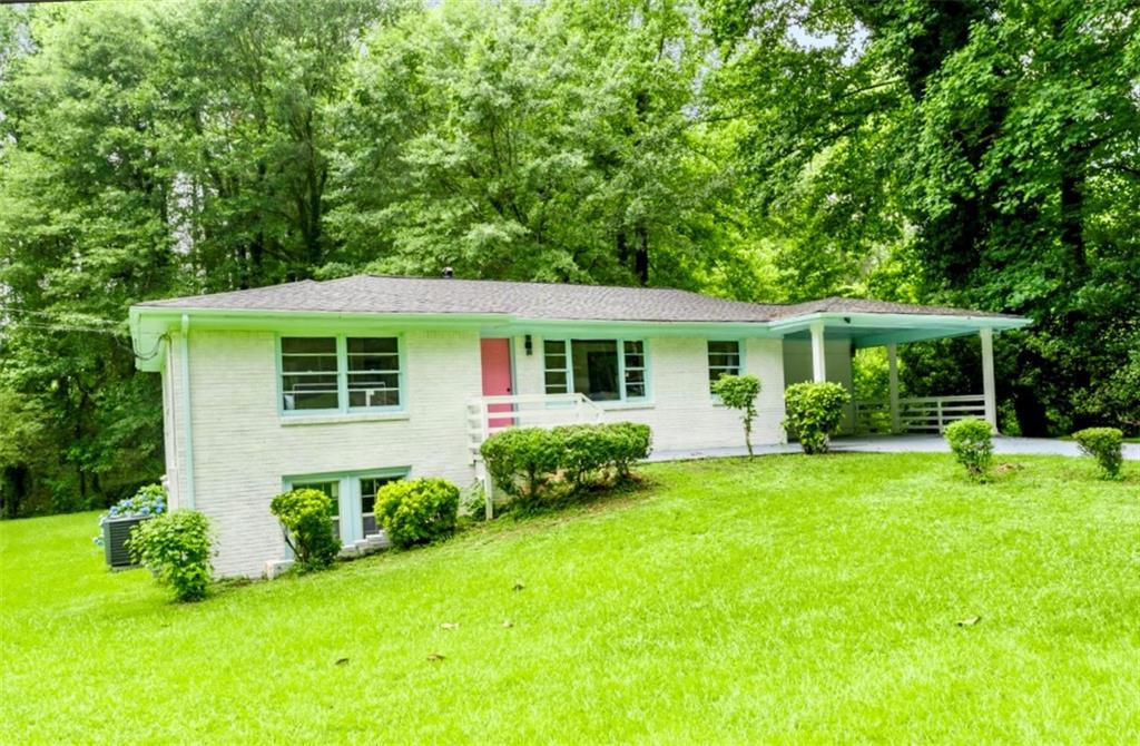 2343 Dawn Drive Decatur, GA 30032 - Photo 2 of 20 a view of a house with a backyard