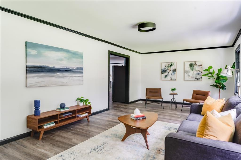 2343 Dawn Drive Decatur, GA 30032 - Photo 8 of 20 a living room with furniture and wooden floor