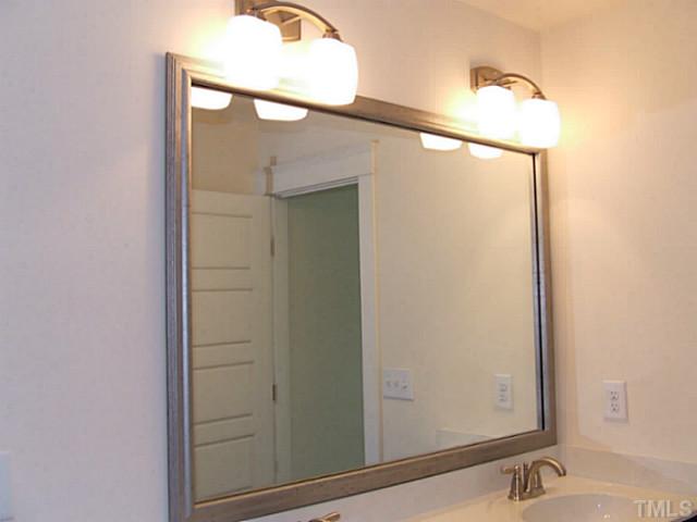 7843 Allscott Way Raleigh, NC 27612 - Photo 11 of 21 Beautiful antiqued silver framed mirror in MBA.