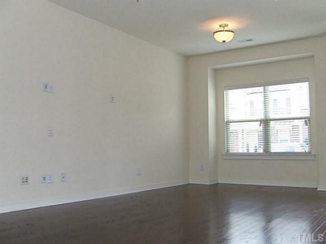 7843 Allscott Way Raleigh, NC 27612 - Photo 5 of 21 Open family room wired for home theater, plus twin window bump out and gleaming hardwood floors! Check out the windows, we include the 2" faux wood blinds on all windows!