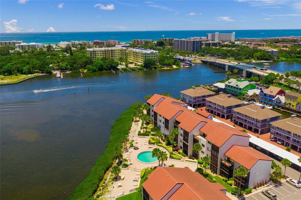 an aerial view of a house with a lake view