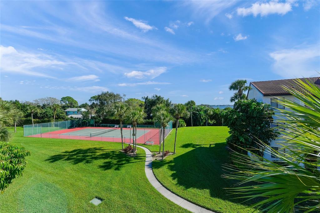 1630 Stickney Point Road, Unit 101 Sarasota, FL 34231 - Photo 28 of 40 a view of an outdoor space yard patio and entertaining space