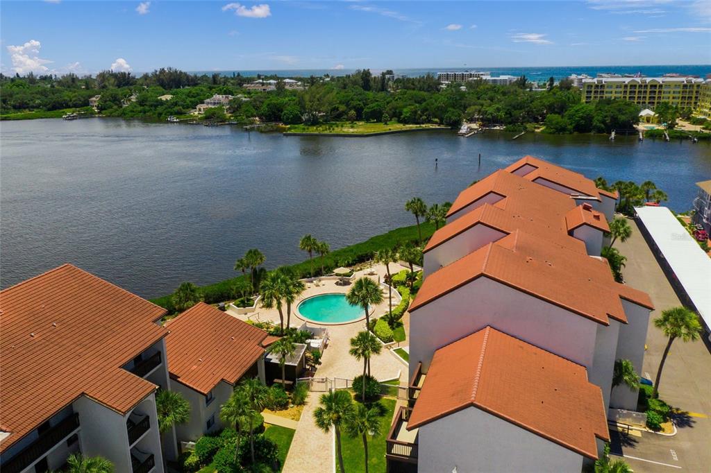 1630 Stickney Point Road, Unit 101 Sarasota, FL 34231 - Photo 31 of 40 an aerial view of a house with a lake view