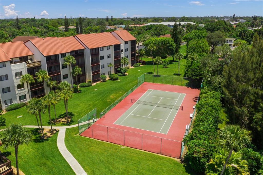 1630 Stickney Point Road, Unit 101 Sarasota, FL 34231 - Photo 33 of 40 an aerial view of a house