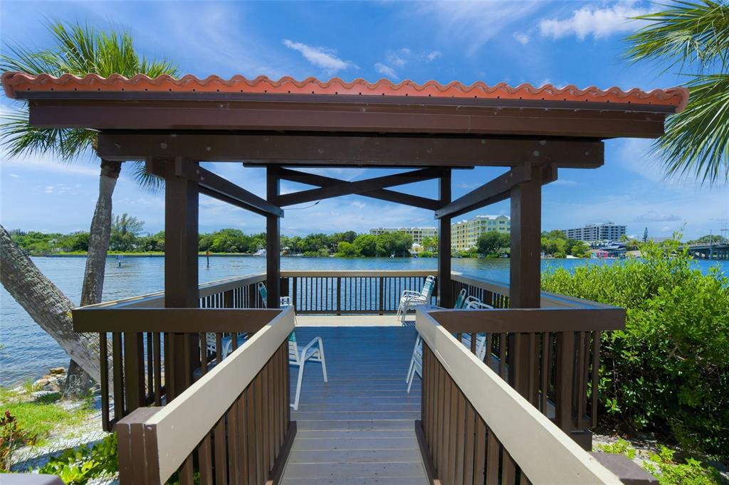 1630 Stickney Point Road, Unit 101 Sarasota, FL 34231 - Photo 37 of 40 a view of a balcony with furniture