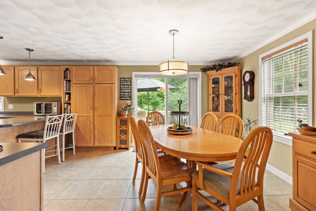 9 Campbell Road Billerica, MA 01821 - Photo 11 of 31 a view of a dining room with furniture window and outside view