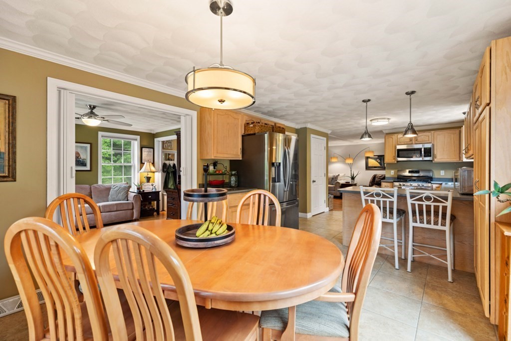 9 Campbell Road Billerica, MA 01821 - Photo 12 of 31 a view of a dining room with furniture